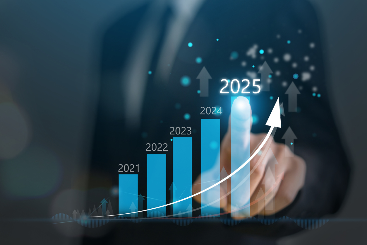Image with business man standing beside chart showing exponential growth in private equity activity in 2025.